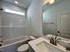 Bathroom with single vanity and a bathtub at 32 S Mistflower St, Clayton, NC 27520