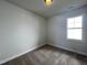 Simple bedroom with neutral decor and carpet flooring at 32 S Mistflower St, Clayton, NC 27520