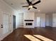 Bright living room with built-in shelving and fireplace at 32 S Mistflower St, Clayton, NC 27520