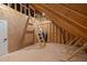 Spacious unfinished attic with exposed wood framing, ladder, and utilities at 65 Cherry Bark Dr, Youngsville, NC 27596