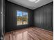 Elegant office space featuring dark accent walls, modern design elements and natural light at 65 Cherry Bark Dr, Youngsville, NC 27596