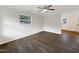The spacious living area has hard surface floors and neutral paint with a window to the exterior at 225 W Orange St, Hillsborough, NC 27278