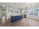 Modern kitchen with a central island, stainless steel appliances, and plenty of counter space at 63 Falls River Ct, Broadway, NC 27505