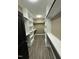 Organized walk-in closet with custom shelving and ample storage space for clothing and accessories at 2829 Faucette Ln, Burlington, NC 27217