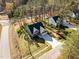An aerial shot of the neighborhood showing the home's location and surrounding streets at 100 Carol Cir, Louisburg, NC 27549