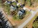 High angle aerial view of the home, highlighting its location on a quiet street at 100 Carol Cir, Louisburg, NC 27549