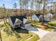 Overhead aerial view of the home highlighting the well-kept lawn and adjacent properties at 100 Carol Cir, Louisburg, NC 27549
