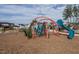 A fun community playground with slides and climbing structures for families to enjoy at 123 Cottage Way, Pittsboro, NC 27312