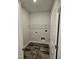 Laundry room with tiled floors and washer/dryer hookups at 28 Decatur Dr, Fuquay Varina, NC 27526