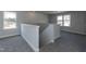 Carpeted upstairs hallway with stairwell at 42 Decatur Dr, Fuquay Varina, NC 27526