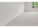 Bright bedroom featuring neutral carpet, white walls, and baseboards at 30 Spanish Oak Dr, Youngsville, NC 27596