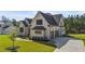 Charming two-story home with a 2-car garage and landscaped yard at 30 Spanish Oak Dr, Youngsville, NC 27596