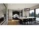 Spacious kitchen featuring white countertops and a dining area with contemporary black chairs and decor at 512 Gordon St # 1102, Durham, NC 27701