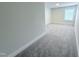 Spacious bedroom boasts neutral carpet, ample natural light and a clean, minimalist design at 85 Claude Creek Way, Smithfield, NC 27577
