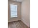 This bedroom features a window, hardwood floors, and plenty of natural light at 85 Claude Creek Way, Smithfield, NC 27577