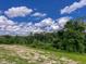 Expansive land with rolling hills and lush greenery, perfect for building a dream home at 85 Claude Creek Way, Smithfield, NC 27577