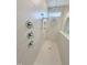 Modern walk-in shower with rain shower head, handheld sprayer, and sleek chrome fixtures at 85 Claude Creek Way, Smithfield, NC 27577