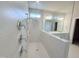 Modern walk-in shower with rain shower head, handheld sprayer, and sleek chrome fixtures at 85 Claude Creek Way, Smithfield, NC 27577