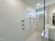Modern walk-in shower with rain shower head, handheld sprayer, and sleek chrome fixtures at 85 Claude Creek Way, Smithfield, NC 27577