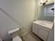 Bathroom with vanity, mirror, and a toilet at 199 Grand Griffon Way, Lillington, NC 27546