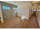 Dining room with hardwood flooring and stylish light fixture at 199 Grand Griffon Way, Lillington, NC 27546