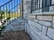 Detailed view of the stone work and steps leading to the home's entrance at 199 Grand Griffon Way, Lillington, NC 27546