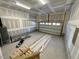 Spacious garage with concrete flooring and white walls at 199 Grand Griffon Way, Lillington, NC 27546