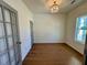 Office space featuring a modern light fixture and hardwood flooring at 199 Grand Griffon Way, Lillington, NC 27546