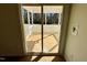 Screened porch with sliding glass doors leading to interior at 199 Grand Griffon Way, Lillington, NC 27546