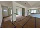 Bright living room featuring an open floor plan and hardwood floors at 217 Grand Griffon Way, Lillington, NC 27546