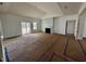 Spacious living room with fireplace and access to backyard at 217 Grand Griffon Way, Lillington, NC 27546