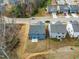 A beautiful residential street from above, lined with well-kept homes, spacious yards and mature trees at 313 Mason Oaks Dr, Wake Forest, NC 27587