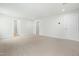 Spacious basement featuring neutral paint and carpet, several doorways, and recessed lighting at 313 Mason Oaks Dr, Wake Forest, NC 27587