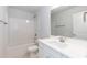 Clean bathroom featuring a shower-tub combo, single sink, and white finishes at 499 Glenkirk Pl # 101, Garner, NC 27529