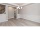 Bright dining room with hardwood floors and access to kitchen at 499 Glenkirk Pl # 101, Garner, NC 27529