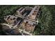 Aerial view of the community featuring townhomes with rooftop decks at 704 Chatham View Rd # 12, Cary, NC 27511