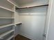 Spacious closet featuring custom shelving and hanging rods for optimal organization at 704 Chatham View Rd # 12, Cary, NC 27511