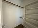 Well-organized closet showcasing custom shelving and hanging space at 704 Chatham View Rd # 12, Cary, NC 27511
