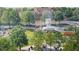 Beautiful outdoor space featuring a fountain, lush greenery, and gathering spots near the Cary Arts Center at 704 Chatham View Rd # 12, Cary, NC 27511