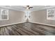Bright bedroom featuring lots of natural light and vinyl plank flooring for a cozy retreat at 1129 Brookfield Dr, Gibsonville, NC 27249