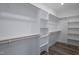 Organized walk-in closet featuring shelving and rod space for your entire wardrobe at 1129 Brookfield Dr, Gibsonville, NC 27249