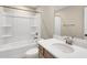 Bathroom featuring a combined tub and shower, a toilet, and a vanity sink at 1129 Brookfield Dr, Gibsonville, NC 27249