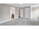 Bedroom including ensuite bathroom, neutral paint and plush carpeting at 1129 Brookfield Dr, Gibsonville, NC 27249