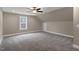 Finished bonus room with a ceiling fan and dormer window at 1229 Brookfield Dr, Gibsonville, NC 27249