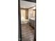 Charming bathroom featuring a free-standing tub, wood floors, and a wood vanity at 3027 Nc Highway 210, Smithfield, NC 27577