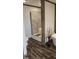 Bathroom featuring wood accents, wood floors, and glass shower at 3027 Nc Highway 210, Smithfield, NC 27577