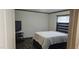 Simple bedroom features clean lines and cozy furniture at 3027 Nc Highway 210, Smithfield, NC 27577