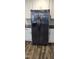 The kitchen has a large side-by-side refrigerator with stainless steel finish at 3027 Nc Highway 210, Smithfield, NC 27577