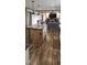 The island in the kitchen has a butcher block top and custom cabinets at 3027 Nc Highway 210, Smithfield, NC 27577
