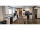 Modern kitchen with stainless steel appliances, a kitchen island, and great lighting at 3027 Nc Highway 210, Smithfield, NC 27577